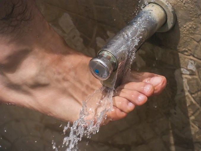wash feet regularly